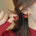 Red Enamel Butterfly Stud Earrings with Gold Tone Trim view 2