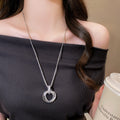 Silver Interlocking Ring Pendant Long Chain Necklace view 1