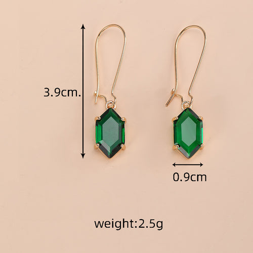 Green hexagon crystal earrings with printed size and weight chart