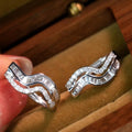 Silver Tone Wave Baguette Clear Stone Huggie Hoop Earrings view 1