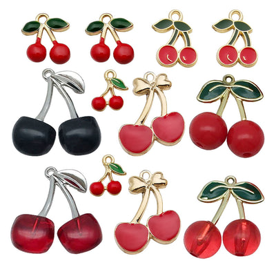 Colorful cherry charms arranged on a light background