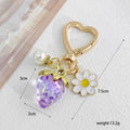 Resin Strawberry Charm Keychain with Enamel Daisy Accent view 4