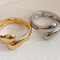 Twisted Teardrop Open Hinge Bangle Gold and Silver view 4