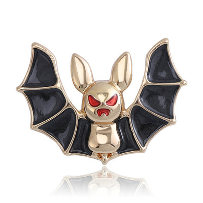 Front product view of the black wing bat brooch on a light background