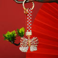 Striped Crystal Bow Keychains with Jeweled Wrist Straps in Five Colors view 4