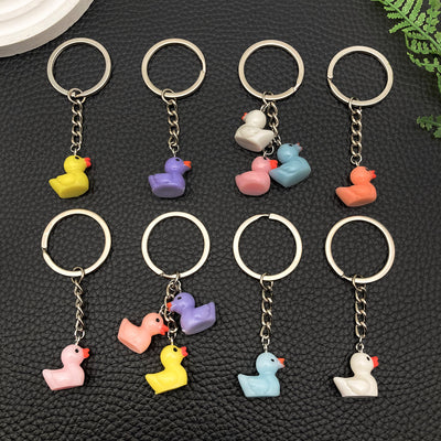 Overview showing the available color and design variations of the colorful mini resin duck metal keychain