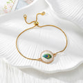 Gold Tone Peacock Feather Evil Eye Slider Bracelets in Nine Shapes view 6