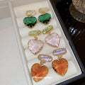 Faceted Heart Drop Earrings in Emerald Green and Amber Brown view 1
