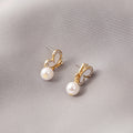 Gold Butterfly Huggie and Pearl Look Bead Dangle Earrings view 1