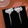 Silver Metallic Bow Triple Wire Fringe Stud Earrings view 6