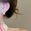 Gold Tone Clear Crystal Pave Star Huggie Hoop Earrings view 4