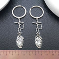 Silver Tone Heartbeat Stethoscope and Anatomical Heart Keychain view 2