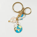 Gold Tone Travel Tag and Globe Split-Ring Keychains in Three Designs view 3