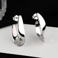 Gold White Tone Twisted U Shape Polished Stud Earrings Pair view 2