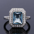 Silver Tone Blue Rectangular Stone Double Halo Ring view 1