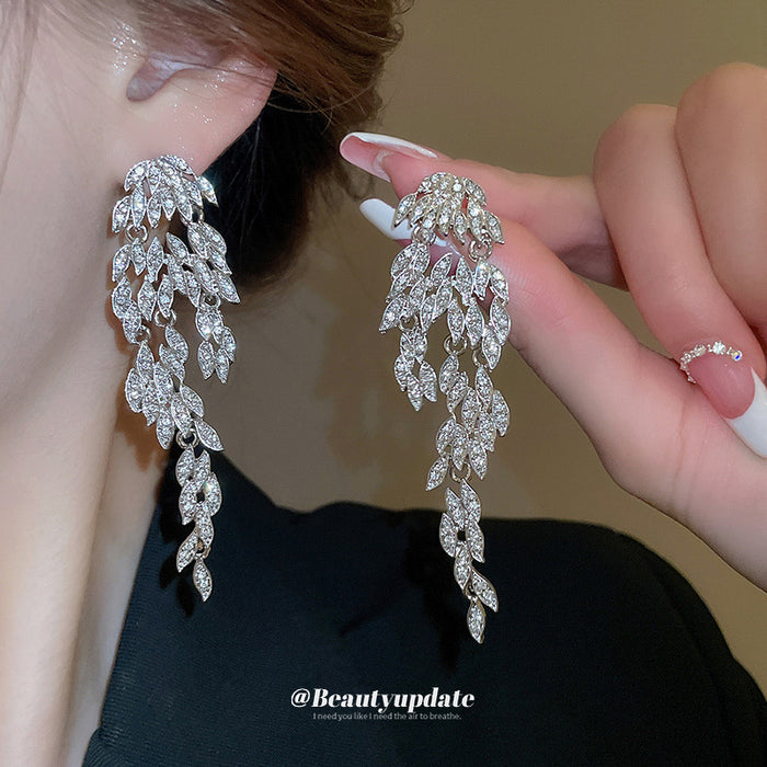 Silver Tone Crystal Leaf Chandelier Earrings With Long Fringe