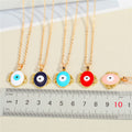 Gold Tone Ornate Round Evil Eye Pendant Necklaces in Six Colors view 2