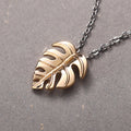 Monstera Leaf Pendant Necklace in Gold and Silver Tone Options view 3