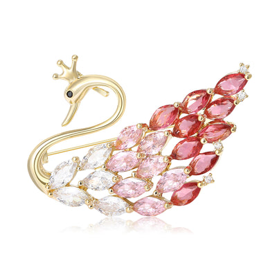 Front view of the pink crystal swan brooch with gold tone outline decorative clothing pin on a white background