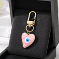 Heart Resin Evil Eye Clip Keychains in Six Color Options view 4