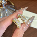 Gold and Silver Pearl Look C Shape Huggie Stud Earrings view 6