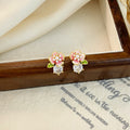 Pink Floral Crystal Stud Earrings With Polished Metal Details view 6