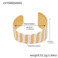 Broad Wavy Open Cuff Bracelet in Polished Gold Tone view 6