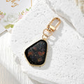 Black Resin Pressed Flower Keychains in Six Designs view 8