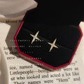 Gold Tone Clear Stone Four Point Starburst Stud Earrings view 3
