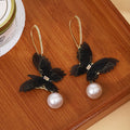 Black Mesh Butterfly White Pearl Look Long Huggie Earrings view 2