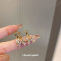 Gold Crystal Bow Huggie Hoop Earrings Polished Metal Jewelry view 2