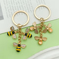 Bee and Honeycomb Charm Keychains Featuring Yellow Sunflower Across 47 Pictured Variations view 3