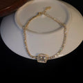 Gold Tone Tennis Bracelet With Square Clear Crystal Halo Center view 6