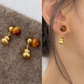 Brown Cabochon Stud Earrings with Gold Tone Gourd Drops view 1