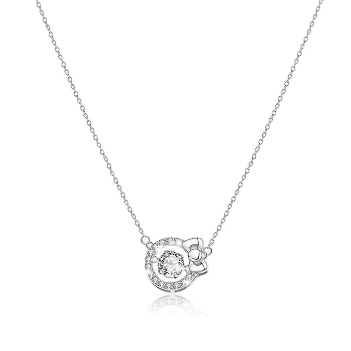 Silver Tone Open Circle Crystal Bow Pendant Necklace
