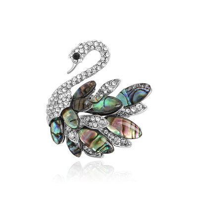 Main front view of Silver Tone Swan Brooch With Iridescent Shell Leaf Feathers