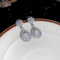 Silver Tone Floral Teardrop Earrings and Statement Necklace view 6