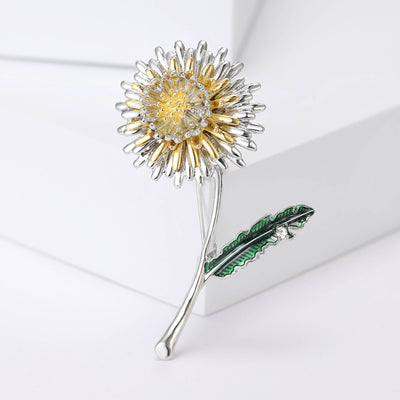 Front view of the long stem dandelion brooch with yellow and green enamel brooch and its color options