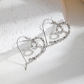 Hammered Gold and Silver Spiral Heart Hook Earrings view 6