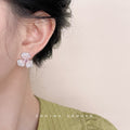 Silver Tone Clear Pink Textured Four Petal Flower Stud Earrings view 2