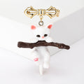 White Cat On Branch Brooch Gold Bow Dangle Enamel Pin view 1