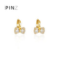 Pavé CZ Bow Huggie Hoop Earrings Gold and Silver Tones view 4