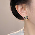 Gold Black Enamel Geometric Bow Black Square Stone Studs view 2