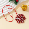 Beaded Red Snowflake Pendant Necklace With White Accents view 1