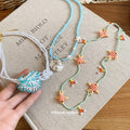 Coastal Beaded Necklace in Three Shell Inspired Designs view 4