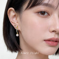 Gold Tone Clear Stone Bow Long Tail And White Pearl Stud Earrings view 2