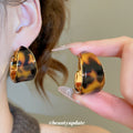 Gold Tone Wide Hoop Earrings with Curved Resin Panels view 4