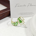 Clear Resin Dried Flower Gold Rim Hoop Earrings 2 Colors view 3