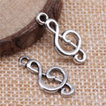 Treble Clef Metal Charm Pendant in Two Vintage Finishes view 2