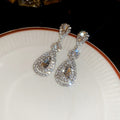 Crystal Teardrop Statement Earrings in Gold and Silver Tones view 7